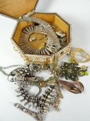 A small octagonal Indian casket containing a quantity of costume and other jewellery Condition