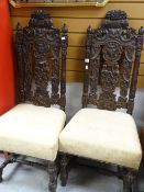 A pair of carved cushion seated antique hall chairs Condition reports provided on request by email