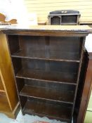 A vintage stained oak four-shelf open bookcase Condition reports provided on request by email for