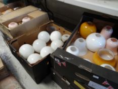 A large parcel of coloured and decorated glass lamp shades (nine boxes) Condition reports provided