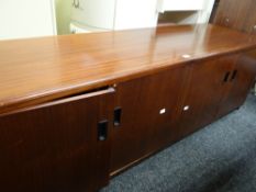 A mid-century mahogany effect sideboard base Condition reports provided on request by email for this