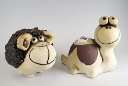 Two John Hughes of Pontypridd Grogg Shop pottery animals to include snail and sheep Condition