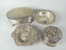 Four silver items comprising two pierced dishes, a circular silver ring-box and a footed oval