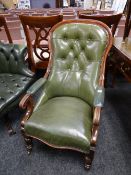 A buttoned green leather armchair with serpentine front and studded covering Condition reports