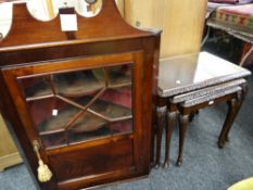 A good quality nineteenth century mahogany hanging corner cabinet with semi-glazed door and broken