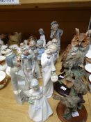 Ten Spanish factory porcelain figures including Nao together with two pottery bird sculptures