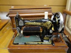 A vintage cased sewing machine Condition reports provided on request by email for this auction