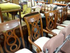 A set of six (4+2) reproduction dining chairs with cushioned seats (re-upholstery required)