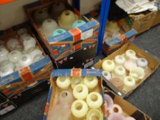 Nine crates of various coloured, patterned and clear glass light shades Condition reports provided