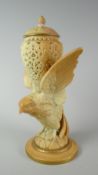 A Royal Worcester blush ivory and gilt eagle pot pourri with reticulated bowl and cover, 22cms high,