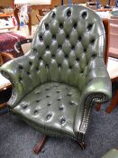 A good reproduction buttoned leather club-style swivel chair Condition reports provided on request