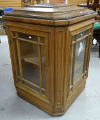 An imposing vintage floor standing mixed wood humidor cabinet, square based and having four glazed