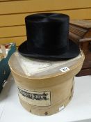 A vintage cased Dunn & Co top-hat Condition reports provided on request by email for this auction