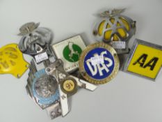 Tin of eight vintage motoring grill badges with brackets Condition reports provided on request by