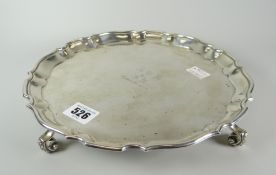 Silver pie-crust edge salver raised on four scroll feet, Glasgow 1919, maker's initials R&W S,