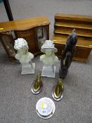 Stylized treen figure, a pair of composition busts, two brass horse head ornaments, a wooden