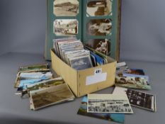 Vintage album and a loose quantity of collector's postcards including some local views, busy