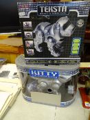 Boxed Electronic Kitty, the Teksta Kitten and a similar boxed puppy