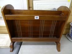 Vintage mahogany magazine rack with lion mask ring carry handles