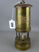 Reproduction brass miner's lamp marked 'Cymru'