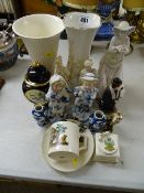 W H Goss crested cup and saucer 'Arms of Berwick Upon Tweed', a selection of ornamental figurines