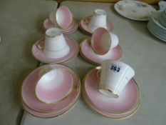 Six Shelley bone china pink and gilt banded trios