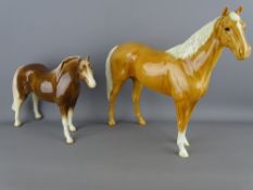 Large Beswick standing model of a palomino and another pottery horse (unknown maker)
