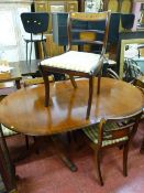 Mahogany oval inlaid twin pedestal dining table with six (four plus two) dining chairs (chair