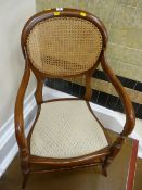 Mahogany cane back salon elbow chair