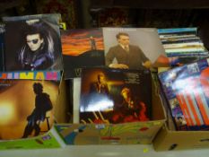 Four boxes of vintage LP records and 12 ins singles, artist include Blondie, Asia, Bon Jovi,