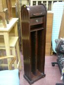 Tambour fronted tall CD rack