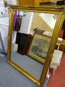 Large gilt framed bevelled edge wall mirror
