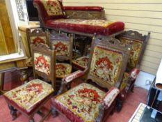 Edwardian nine piece salon suite with carved detail comprising two carvers, six dining chairs and