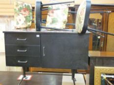 Floral and black decorated retro part dining suite comprising sideboard, table and six chairs