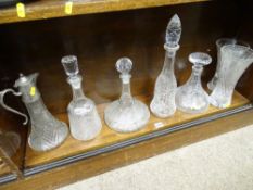 Cut crystal ship's type decanter and stopper, a moulded example, two further decanters, two vases
