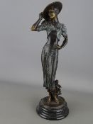 Contemporary bronze figurine of a stylish lady, bears the signature 'F Preiss'