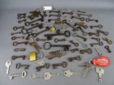Interesting collection of possibly antique iron and later keys, some having triangular end