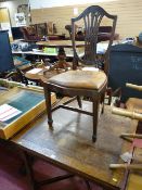 Polished draw leaf table on turned supports with a set of four Hepplewhite style dining chairs