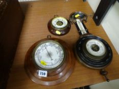 Three vintage wooden mounted wall barometers