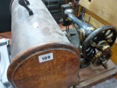 Wooden cased Singer sewing machine