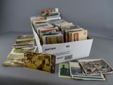 Large quantity (hundreds) of vintage postcards including street scenes, locomotives, an
