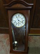 Modern polished wood wall hanging clock