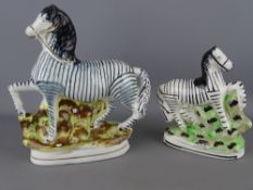 Two Staffs pottery zebra figurines