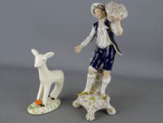 Royal Dux figurine of a young man grape harvesting and a Midwinter figure of Larry the Lamb