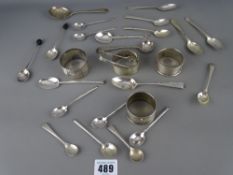 Approx 9 troy ozs of silver napkin rings and spoons
