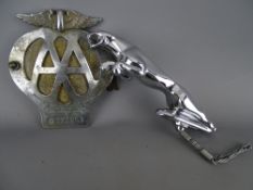 Chrome Jaguar car mascot and a vintage AA car badge no. 0373251