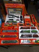 Hornby 00 gauge model railway boxed engines, carriages and rolling stock including a GWR freight
