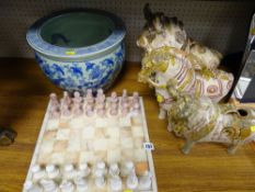 Modern marble chess board with composition chess pieces (damages, one pawn missing), a Chinese