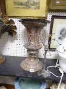 Repousse copper vase and a composition ornamental tree