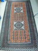 Rust coloured Eastern style rug, 210 x 114 cms